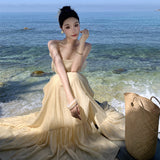 2025 Super fairy seaside vacation dress women's summer halter suspender long dress high atmosphere travel photo fairy dress