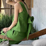 This year, it is popular, beautiful fried street age reduction fashion, ginger leaking back bow top, two-piece suit skirt for women in summer.