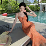 2025 This year, beautiful skirts are popular, white orange floral micro-fishtail suspender dresses, women's waist vacation dresses.