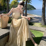 2025 Super fairy seaside vacation dress women's summer halter suspender long dress high atmosphere travel photo fairy dress