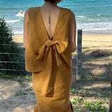 This year, it is popular, beautiful fried street age reduction fashion, ginger leaking back bow top, two-piece suit skirt for women in summer.