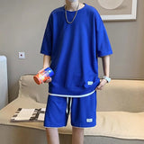 GREATNFB Summer New Waffle Fake Two-Piece Casual Suit Breathable Short-Sleeved T-shirt Fifth Pants Sports Clothing