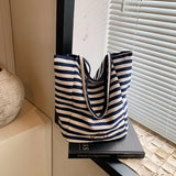 GREATNFB 2025 Korean version of casual large-capacity bag women's bag popular new simple striped canvas bag student class tote bag