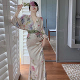 2025 Bathing peony  waist printing temperament dress long sleeve V neck spring dress women's super fire beach skirt seaside