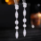 2025 S925 silver needle super fairy temperament light luxury high-end earrings trendy long modified face super flash zircon fringed earrings