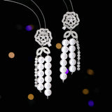 2025 Light luxury, high-end sense, excellent temperament, wedding banquet, bridal earrings, trendy long hollow camellia pearl fringed earrings