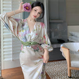 2025 Bathing peony  waist printing temperament dress long sleeve V neck spring dress women's super fire beach skirt seaside