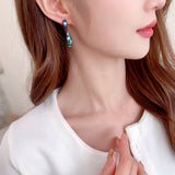2025 S925 silver needle niche design high-end earrings zircon inlaid water drop-shaped earrings Korean Internet celebrity temperament earrings