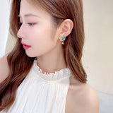 2025 S925 silver needle sweet and clear temperament earrings fairy style advanced sense super flash zircon inlaid water drop flower stud earrings