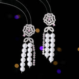 2025 Light luxury, high-end sense, excellent temperament, wedding banquet, bridal earrings, trendy long hollow camellia pearl fringed earrings