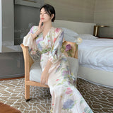 2025 Bathing peony  waist printing temperament dress long sleeve V neck spring dress women's super fire beach skirt seaside