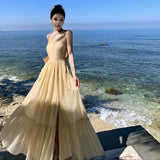 2025 Super fairy seaside vacation dress women's summer halter suspender long dress high atmosphere travel photo fairy dress