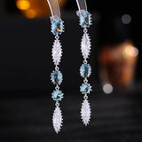 2025 S925 silver needle super fairy temperament light luxury high-end earrings trendy long modified face super flash zircon fringed earrings