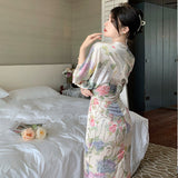 2025 Bathing peony  waist printing temperament dress long sleeve V neck spring dress women's super fire beach skirt seaside
