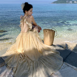 2025 Super fairy seaside vacation dress women's summer halter suspender long dress high atmosphere travel photo fairy dress