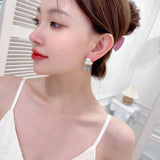 2025 Designer niche high-end s925 silver needle earrings, sweet and fresh temperament dripping oil camellia water drop earrings